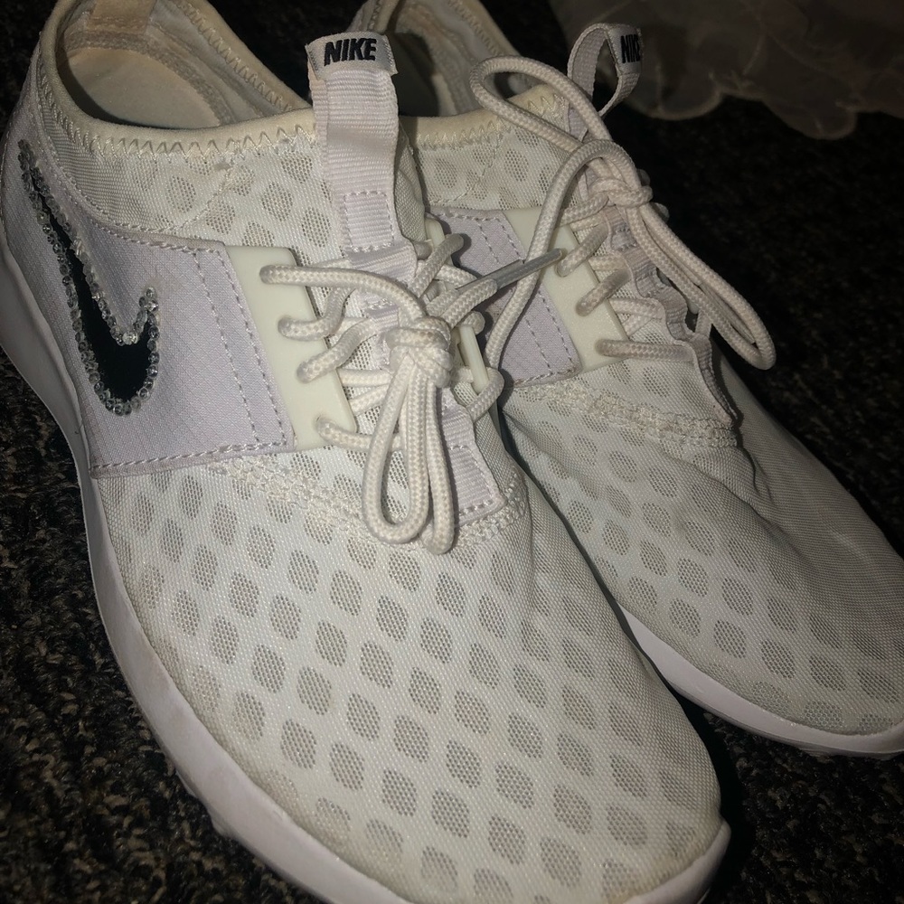 Women’s white Nike bedazzled running shoes